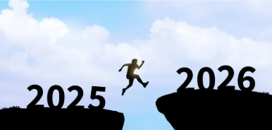 Silhouette of a person leaping across a cliff gap from 2025 to 2026